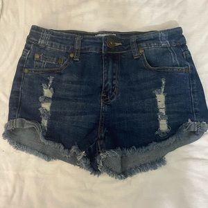Blue ripped jean shorts